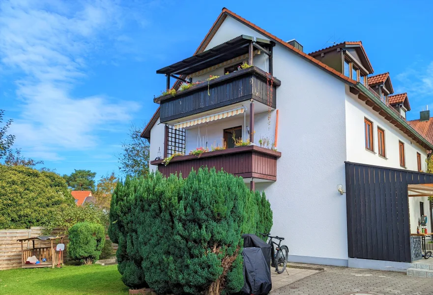 Außenansicht - Wohnung kaufen in Haimhausen - Attraktive 4-Zimmer-Wohnung, viel Platz für die Familie!