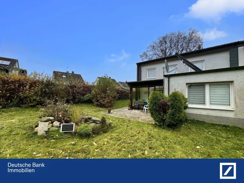 Hausansicht hinten - Haus kaufen in Dortmund - Geräumiges Reihenendhaus mit Wintergarten und vier Schlafzimmern