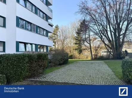 Hausansicht - Wohnung kaufen in Lünen - Stilvolle und barrierefreie Erdgeschosswohnung mit Gartenblick