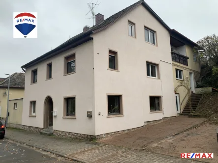 IMG_Front2FHLOGO - Haus kaufen in Wöllstein - Einfamilienhaus mit Einliegerwohnung