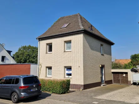 Einfamilienhaus - Haus kaufen in Düren - Einfamilienhaus mit Garten und Garage in ruhiger Lage von Düren Merken