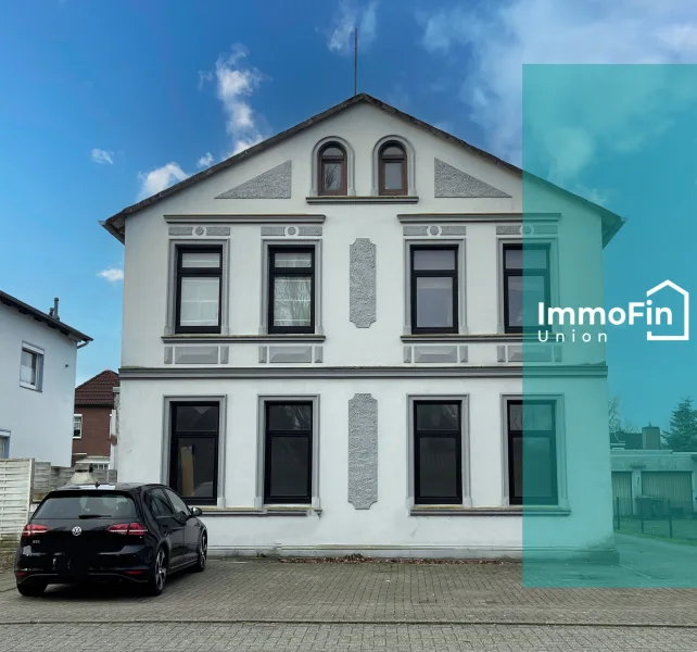 Hausansicht - Haus kaufen in Wilhelmshaven - Investieren Sie in Zukunft: Modernes Mehrfamilienhaus in Wilhelmshaven - Perfekte Renditeimmobilie mit Potenzial!"