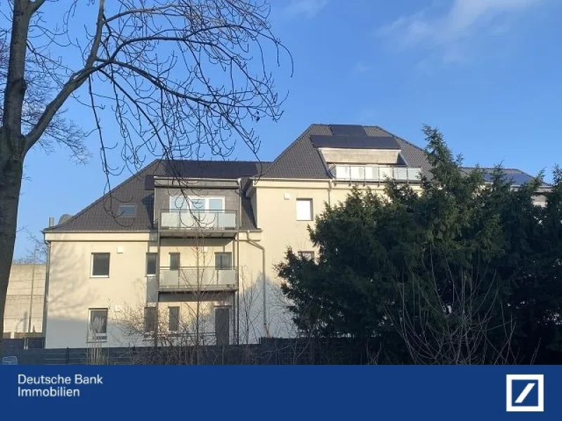 Rückansicht Haus 185 - Wohnung kaufen in Duisburg - Traumhafte DG-Wohnung mit einem sensationellen Energiebedarf von 8,1 kWh/(m²a) - Erstbezug