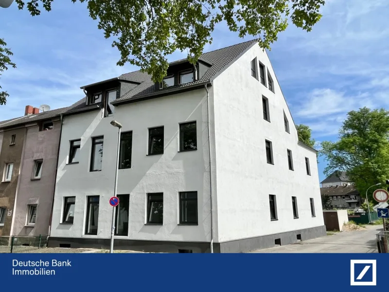 Vorderansicht von Rechts - Wohnung kaufen in Herne - TOP ENERGIE-EFFIZIENZ ++ Vollständig kernsaniert ++ Gehobene Ausstattung ++ Balkon ++ Erstbezug