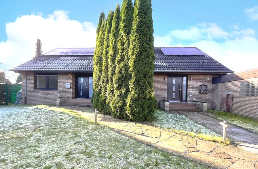 Außenansicht - Haus kaufen in Rheine - Traumhafter Bungalow mit Einlieger-Apartment oder Büro.