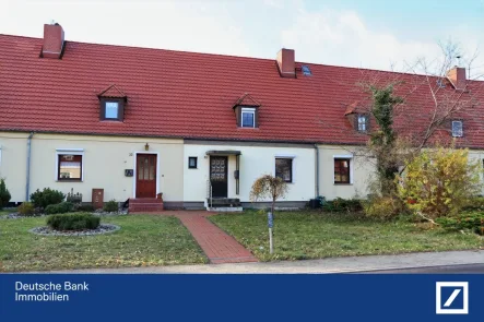 Straßenansicht - Haus kaufen in Karlshagen - Für Selbstnutzer oder als Feriensitz - Gepflegtes und ökonomisches Reihenmittelhaus mit Vollkeller 