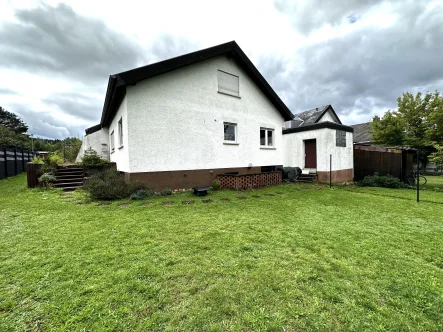Rückansicht - Haus kaufen in Kirkel - **Freistehendes Einfamilienhaus mit Garten in begehrter Wohnlage von Kirkel-Limbach**