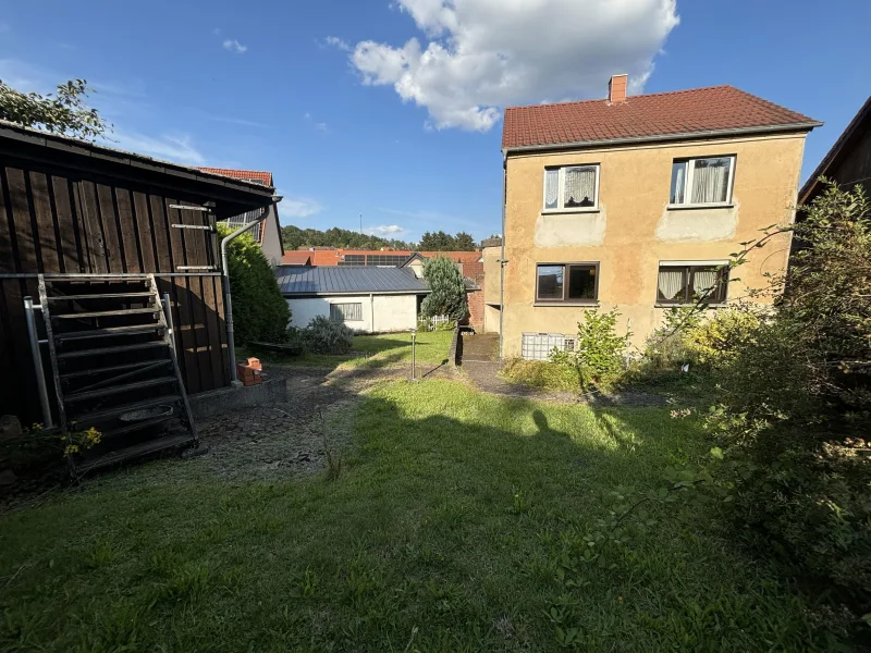 Gartenansicht Holzschuppen