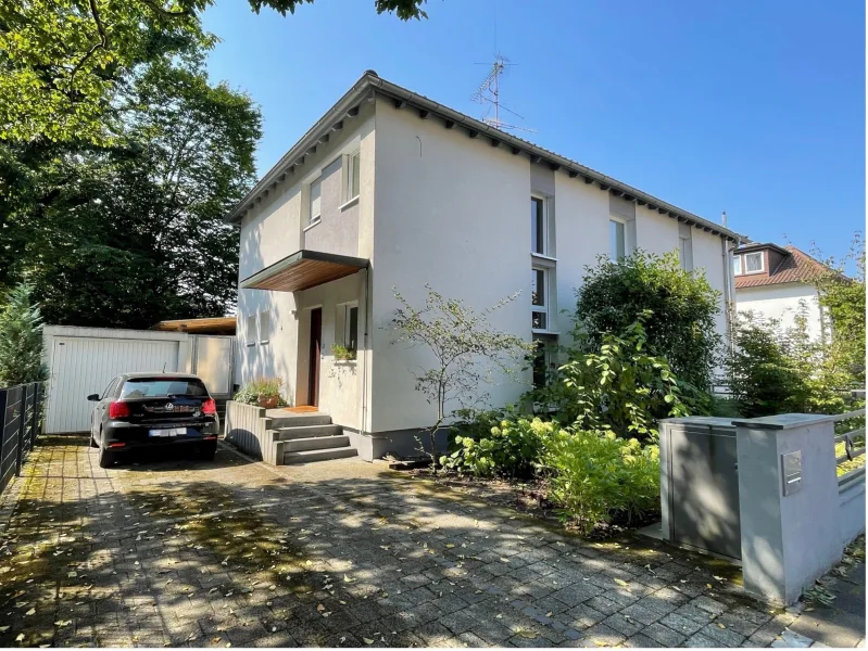 Außenansicht - Haus kaufen in Offenbach - Modernisiertes Zweifamilienhaus in ruhiger Lage 