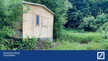 Blick auf Bungalow - Grundstück kaufen in Lindenkreuz - Willkommen auf Ihrem Baugrundstück in Lindenkreuz, Hier finden Sie Ruhe und die Nähe zur Natur.