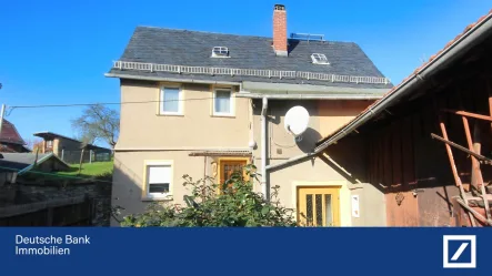 Hausansicht - Haus kaufen in Mohlsdorf-Teichwolframsdorf - Einfamilienhaus mit Potential - Renovierung und Gestaltung nach Ihren Wünschen!