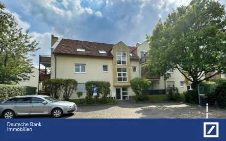 Ansicht Gebäude - Wohnung kaufen in Kesselsdorf - Erdgeschosswohnung mit Terrasse