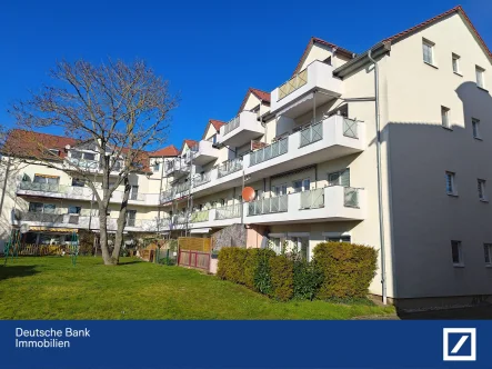 Garten - Wohnung kaufen in Bad Lauchstädt - Schöne 2 Raum Wohnung mit Balkon in ruhiger Lage in Delitz