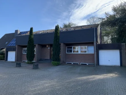 Hausansicht - Wohnung mieten in Kamp-Lintfort - Große 2,5-Zimmer-Wohnung in ruhiger Lage mit Terrasse und Gartennutzung