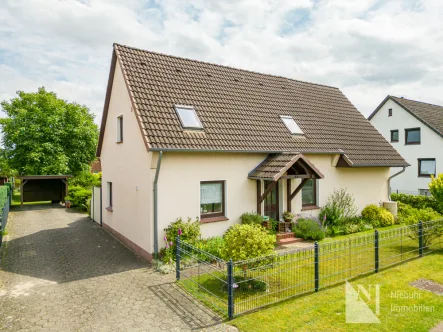 Straßenansicht - Haus kaufen in Radbruch - Gemütliches Einfamilienhaus in Radbruch