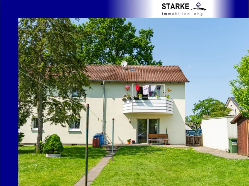 Vorschaubild - Haus kaufen in Espelkamp - Zweifamilien-Doppelhaushälfte mit Garten in Espelkamp