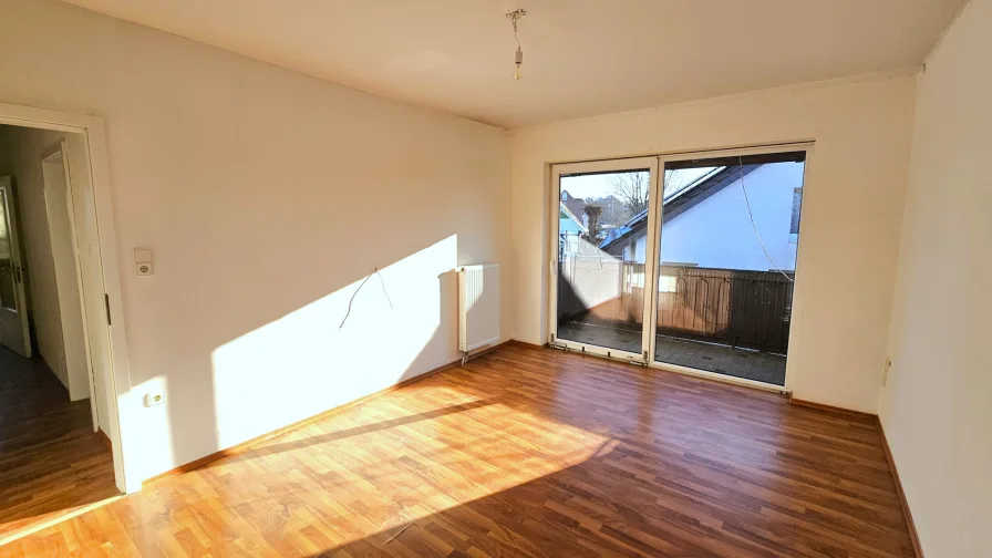 Schlafzimmer mit Balkon im OG