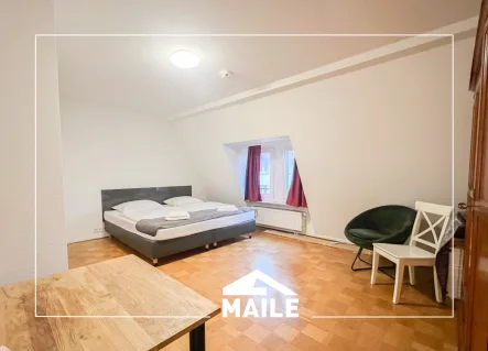 Schlafzimmer - Wohnung mieten in Stuttgart Stuttgart-Mitte - Großzügige 2,5- Zimmerwohnung mit EBK und Balkon und schönem Ausblick!