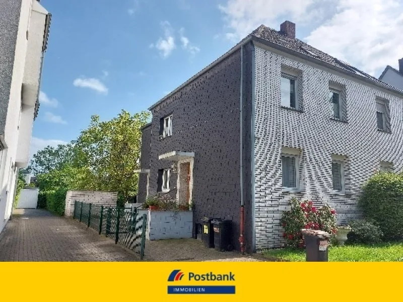 Ansicht - Haus kaufen in Bochum - Doppelhaushälfte mit 2 Wohnungen in Bochum Weitmar