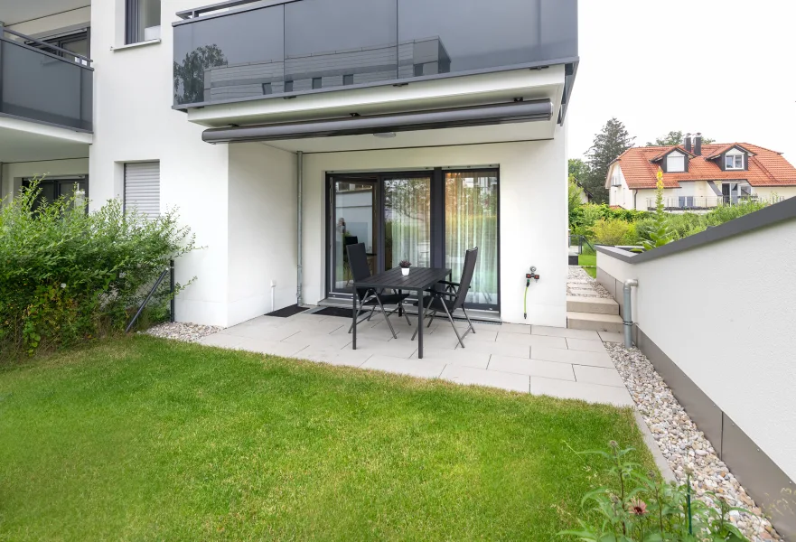 Überdachte Süd-West-Terrasse - Wohnung kaufen in Unterhaching - Neuwertige Wohnung mit umlaufendem Garten