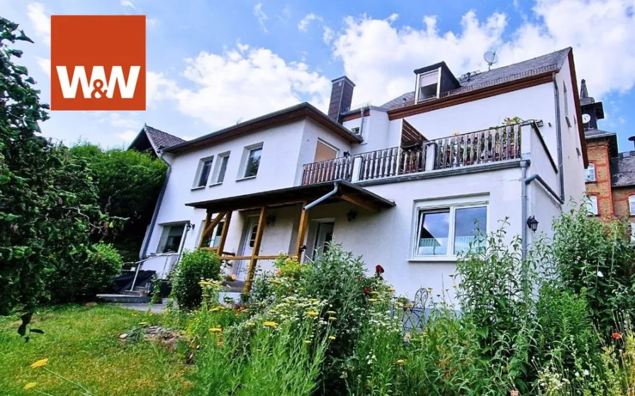 Hausansicht - Haus kaufen in Schlangenbad / Georgenborn - Gepflegtes Mehrfamilienhaus mit 5 Wohneinheiten & guter Mietrendite