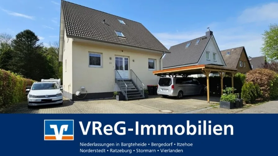 Frontansicht - Haus kaufen in Hamburg - Energieeffizienklasse A+! Junges Einfamilienhaus im Grünen mit über 250m² Wohn-und Nutzfläche!