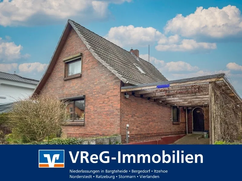 Titelbild - Haus kaufen in Kellinghusen - Einfamilienhaus auf großem Grundstück in Kellinghusen wartet auf neue Eigentümer!