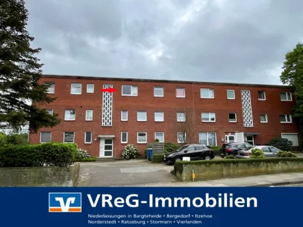 Straßenansicht - Wohnung kaufen in Seevetal - Vermietete Eigentumswohnung in Seevetal Meckelfeld