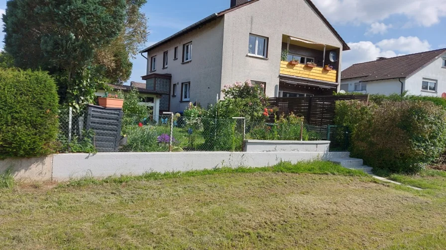 Haus Rückseite - Wohnung kaufen in Werl / Niederbergstraße - Große Eigentumswohnung mit Blick in Felder, Wiesen und Wald!