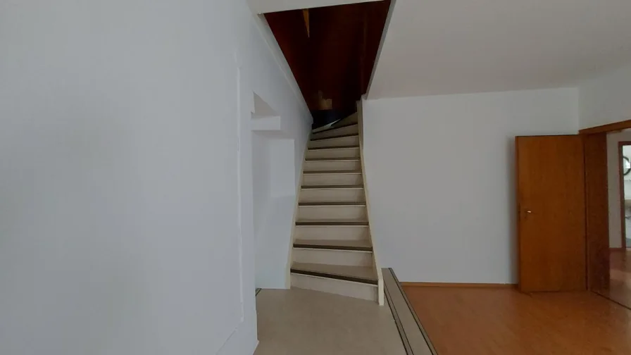 Wohnzimmer Treppe zum Dachgeschoss