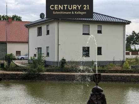 Nordansicht des Hauses - Wohnung kaufen in Lippstadt - !!! Perle am Teich von Dedinghausen !!!