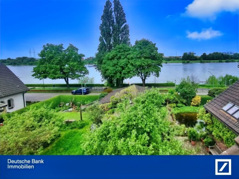 Blick auf den Rhein - Wohnung kaufen in Duisburg - LIEBHABERSTÜCK MIT FRISCHER RHEINLUFT: Gemütliche Maisonettewohnung