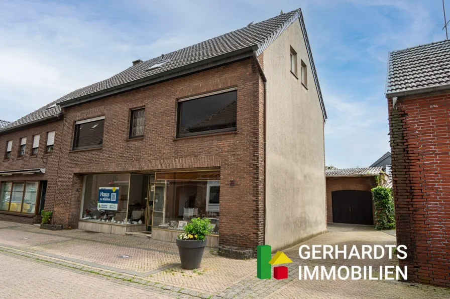 Strassenansicht - Haus kaufen in Bracht - Wohnen, Arbeiten, Neubauen: Ihr flexibles Immobilienprojekt im Herzen von Brüggen-Bracht!