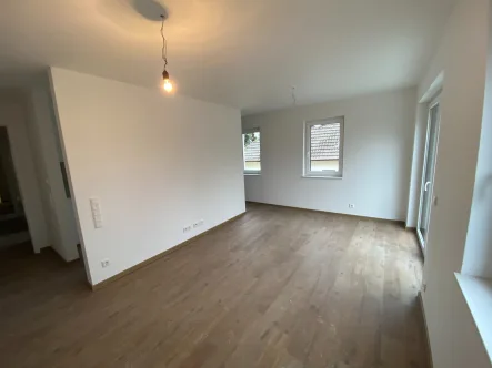 Wohnzimmer - Wohnung mieten in Scherfede - Neubau in Scherfede am Asseler Wald - Wohnung 06