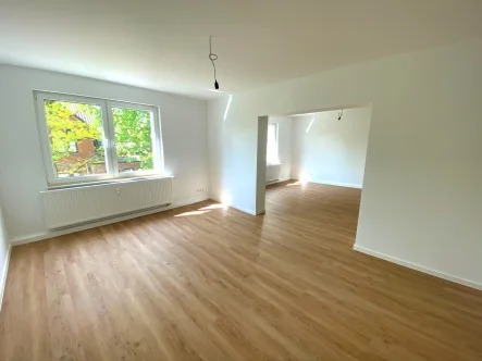 Wohnzimmer - Wohnung mieten in Herford - Modernes Wohnen im historischen Ambiente - Kernsanierte Altbauwohnung in Bahnhofsnähe!