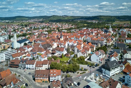 Winnenden - Wohnung kaufen in Winnenden - Rohbaufertigstellung: Moderne 4-Zimmer-Wohnung mit Balkon im Herzen von Winnenden!