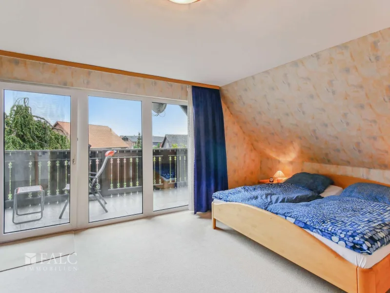 Schlafzimmer mit Balkon