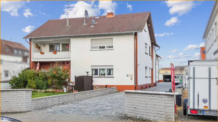  - Haus kaufen in Rödermark / Ober-Roden - Mehrfamilienhaus mit Gewerbeeinheit und Ausbaupotential