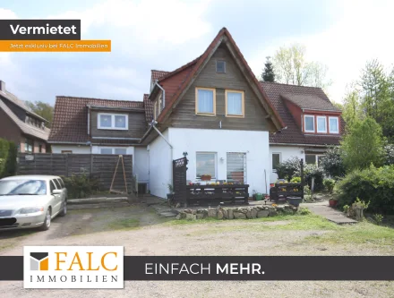 falc-overlay-image-[TIME] - Haus kaufen in Obernkirchen - Mehrfamilienhaus für Kapitalanleger Zentral gelegen und im Grünen