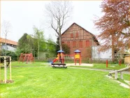 Gebäudeensemble Ansicht vom Spielplatz