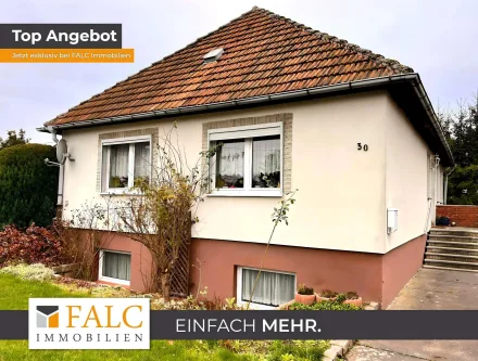 Titelbild - Haus kaufen in Lützow - ***Bungalow in Feldrandlage in einem Ort der alles bietet***