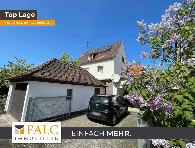 Titelbild - Haus kaufen in Nürnberg - Einzigartige Gelegenheit: Zweifamilienhaus mit Einliegerwohnung in Nürnberg wartet auf neue Bewohner