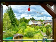 Blick in den Garten aus der Dachterrasse