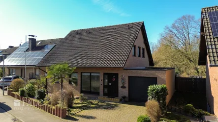 Haus Aussen Ansicht - Haus kaufen in Rommerskirchen - gepflegtes Einfamilienhaus mit großzügigem Garten und Garage – Viel Platz zum Wohlfühlen