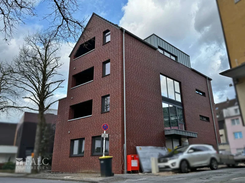 Außenansicht - Wohnung kaufen in Marl - Helle Obergeschosswohnung im Neubau – Zentrale Lage in Marl