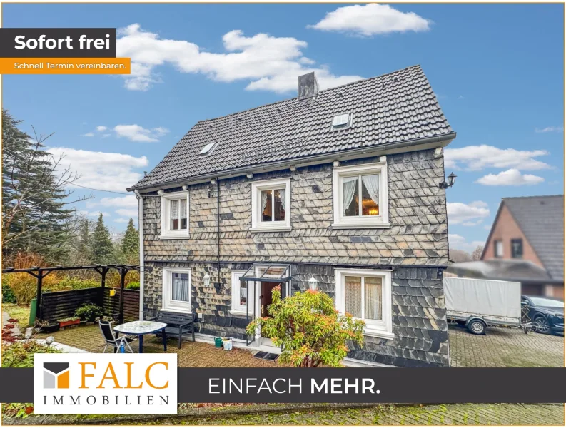 Titelbild - Haus kaufen in Remscheid - Idyllisches Fachwerkhaus mit geräumiger Garage und traumhaftem Gartenbereich