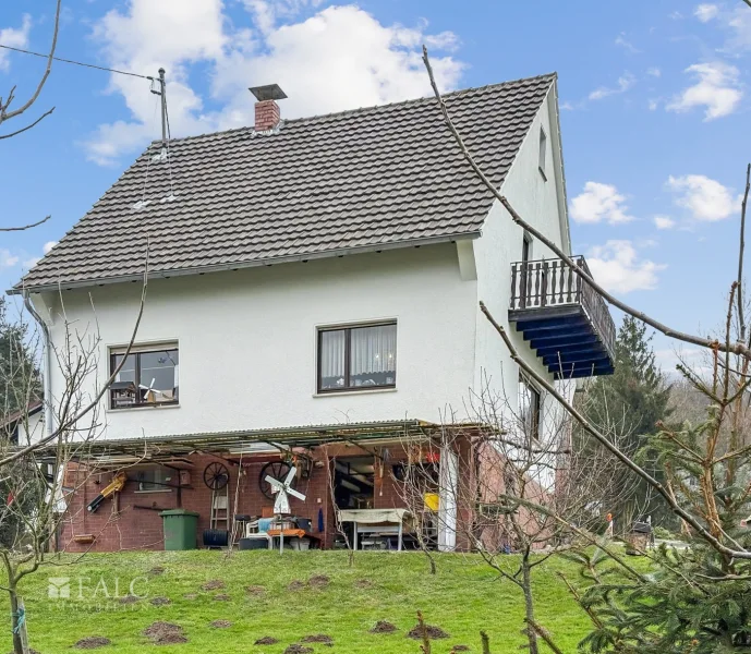 Hausansicht - Haus kaufen in Eitorf - Charmantes Einfamilienhaus mit großzügigem Grundstück und herrlicher Aussicht