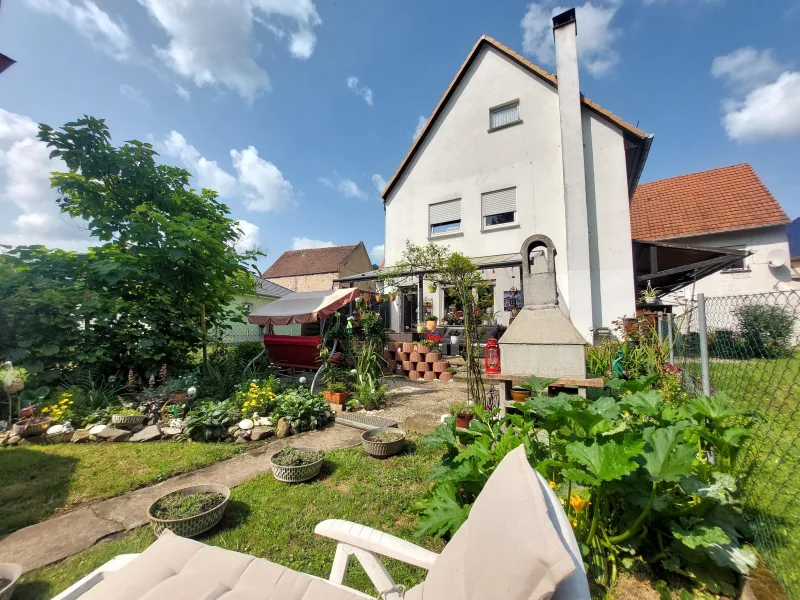 Garten - Wohnung kaufen in Nidda - Ihr modernes Zuhause mit Wohlfühlgarantie in idyllischer Lage mit sonnigem Garten