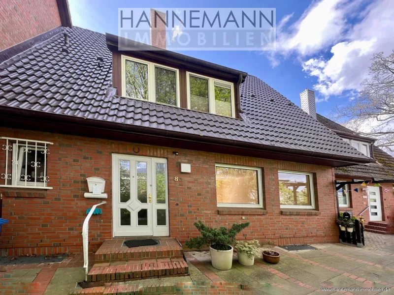HERZLICH WILLKOMMEN - Haus kaufen in Wedel - Mittelreihenhaus mit geschützter Terrasse!