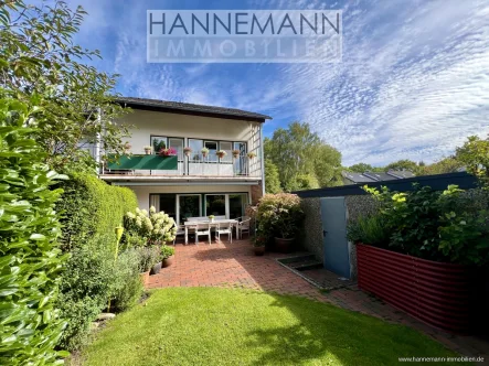 Gartenansicht - Haus kaufen in Wedel - Endlich zuhause ankommen – Reihenendhaus mit Garten & Garage!